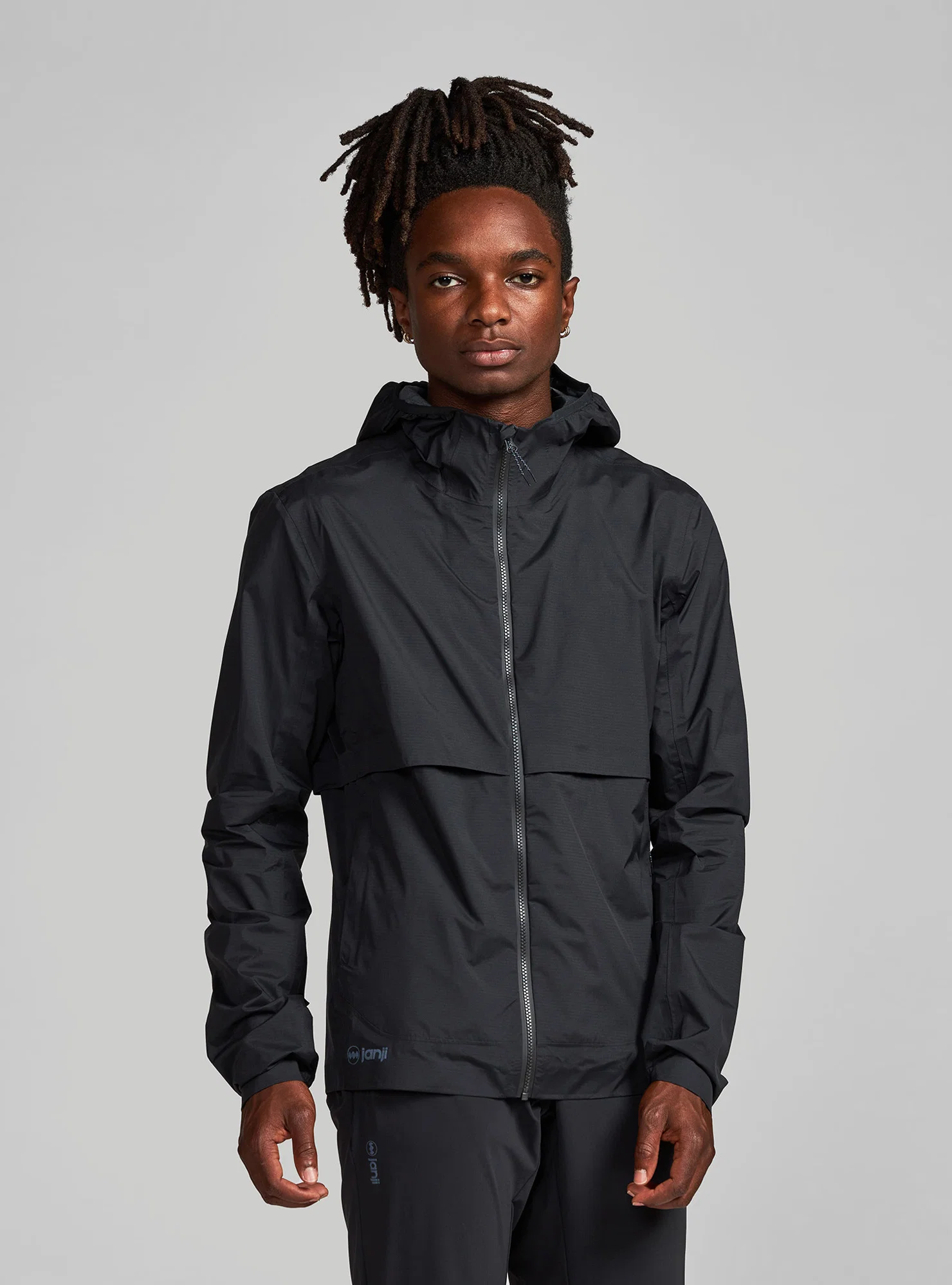 M's Rainrunner Pack Jacket by Janji — recommended by Jamie Hunyor