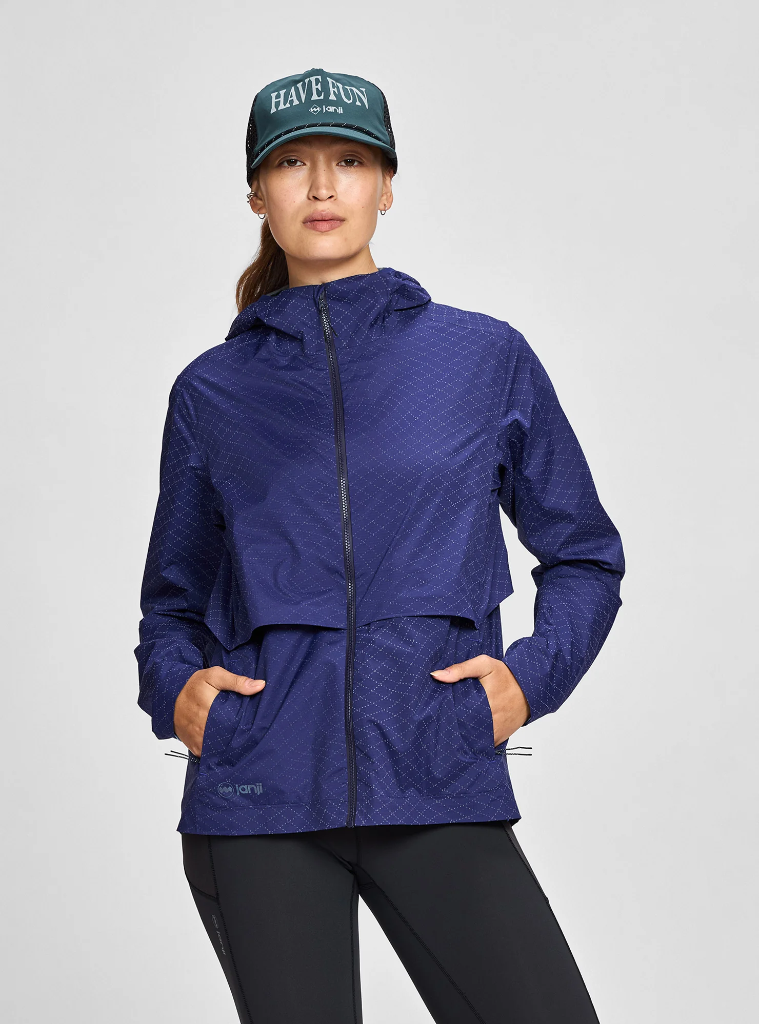 W's Rainrunner Pack Jacket by Janji — recommended by Megan Eckert